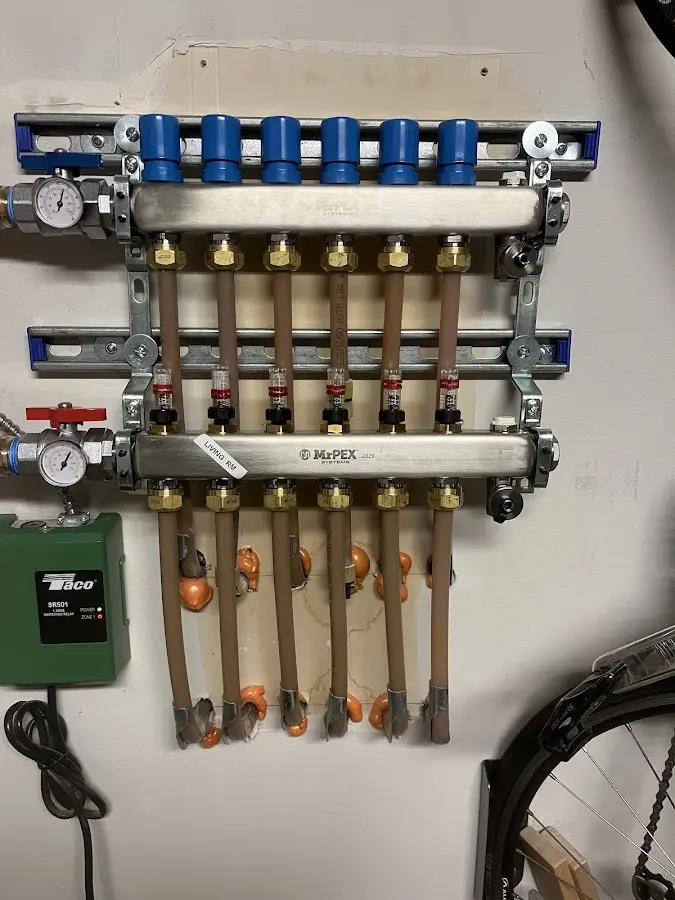 Plumber performing Gas Leak Detection at a residential property in Kentwood